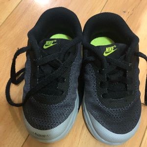 Gray, black and green Nike